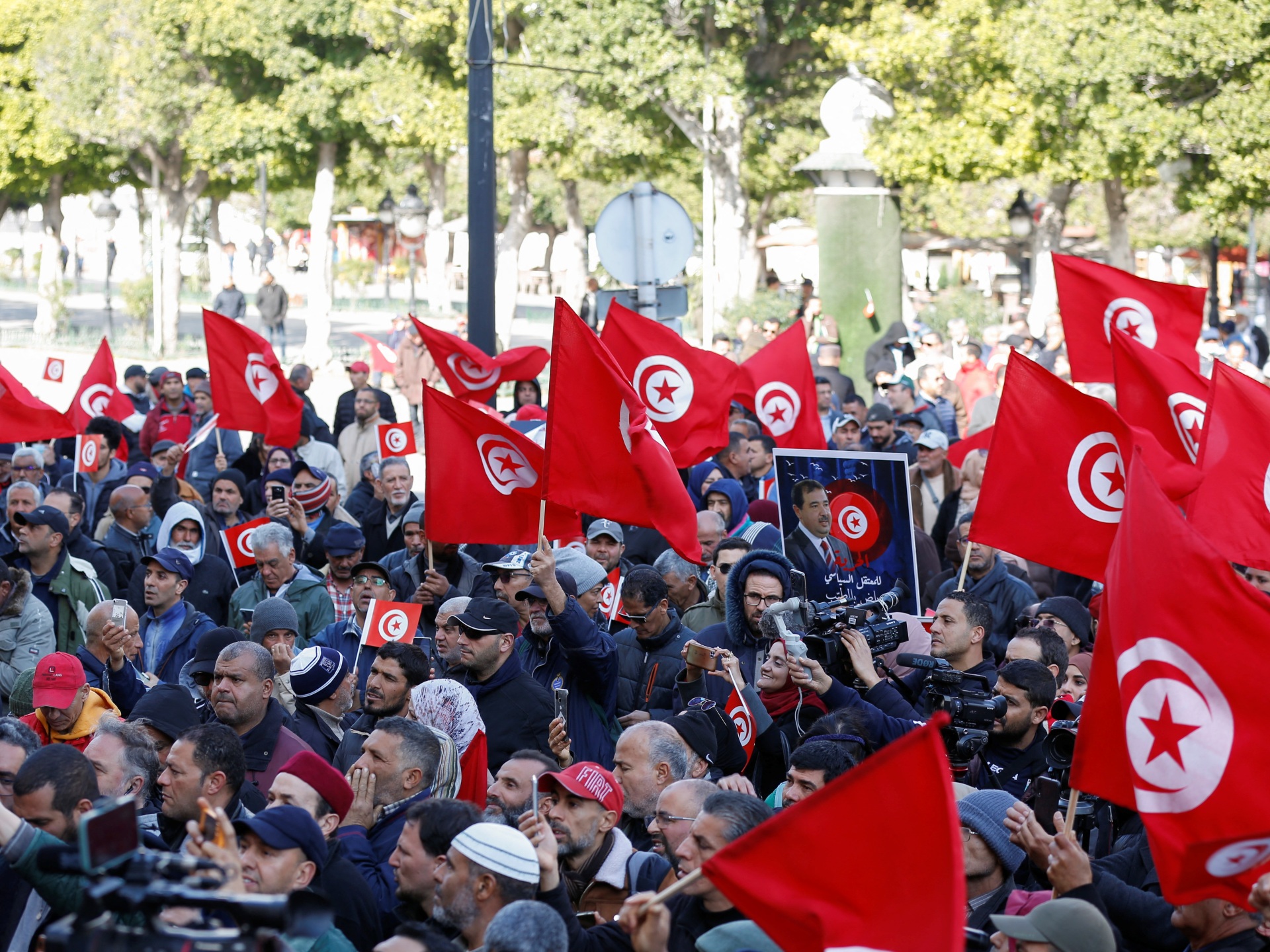 Tunisian opposition defies protest ban, rallies against president