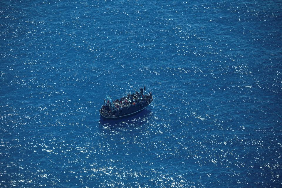 A merchant ship has supplied fuel and water to a boat with around 400 migrants on board which is in distress between Greece and Malta but Maltese authorities have ordered it not to conduct a rescue, German NGO Sea-Watch International said on Monday. The vessel, which departed from Tobruk in Libya amid a sharp rise of migrant boats crossing the Mediterranean from North Africa, was reported to be adrift and taking on water by support service Alarm Phone early on Sunday. Alarm Phone said the boat was in the Maltese Search and Rescue area (SAR). Sea-Watch International, which located the boat with one of its two planes, on Monday accused Malta of not wanting to rescue the people on board despite them being in serious danger and the vessel struggling with 1.5 meter waves. "If the boat keeps moving, it might reach Italy and Malta does not have to accept the people," it said on its Twitter account. Maltese authorities did not respond to several requests for comment. In a separate episode, at least 23 Africans were missing and four died on Saturday after their two boats sank off Tunisia as they tried to reach Italy. Last week 440 migrants were rescued off Malta after a complex 11-hour operation in stormy seas by the Geo Barents vessel of the Doctors Without Borders (MSF) charity. According to press agency ANSA, on Sunday almost 1,000 migrants arrived in the Italian island of Lampedusa, south of Sicily.