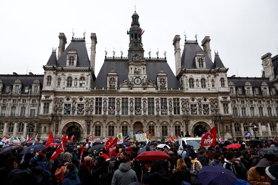 Macron signs contested French pension bill into law