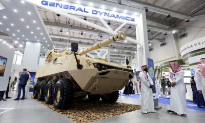 Saudi men are seen at General Dynamics stand displaying the latest defence system at World Defense Show in Riyadh, Saudi Arabia, March 6, 2022. REUTERS/Ahmed Yosri/File Photo