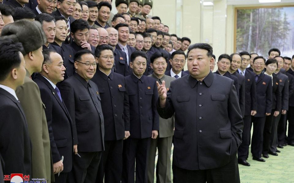 North Korea's leader Kim Jong-un meets with members of the Non-Standing Satellite Launch Preparation Committee, in this picture released by the Korean Central News Agency on November 24, 2023. KCNA via REUTERS