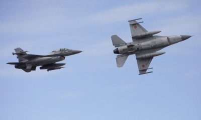 Two Romanian Air Force F-16 perform fly-bys during the inauguration event of the European F-16 Training Center inside the 86th Romanian Airbase, in Fetesti, Romania, November 13, 2023. Inquam Photos/George Calin via REUTERS