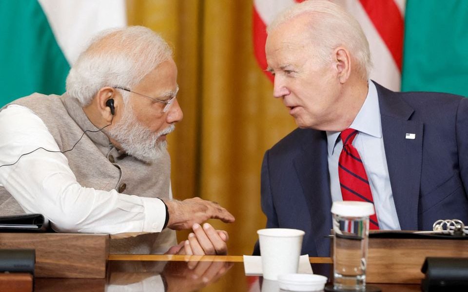 .S. President Joe Biden and India's Prime Minister Narendra Modi talk during a meeting with senior officials and CEOs of American and Indian companies in the East Room of the White House in Washington, U.S., June 23, 2023. REUTERS/Evelyn Hockstein/File Photo