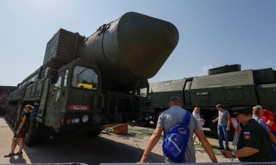Visitors gather near a Russian Yars intercontinental ballistic missile system at an exposition of the international military-technical forum Army-2023 at Patriot Congress and Exhibition Centre in the Moscow region, Russia, August 18, 2023. REUTERS/Stringer/File photo