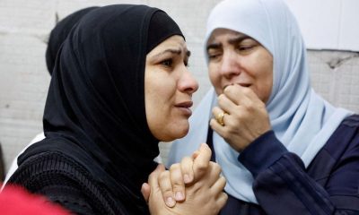 Womean react as they mourn Palestinians who were killed in an Israeli raid, in Tulkarm, in the Israeli-occupied West Bank November 14,2023. REUTERS/Raneen Sawafta Acquire Licensing Rights