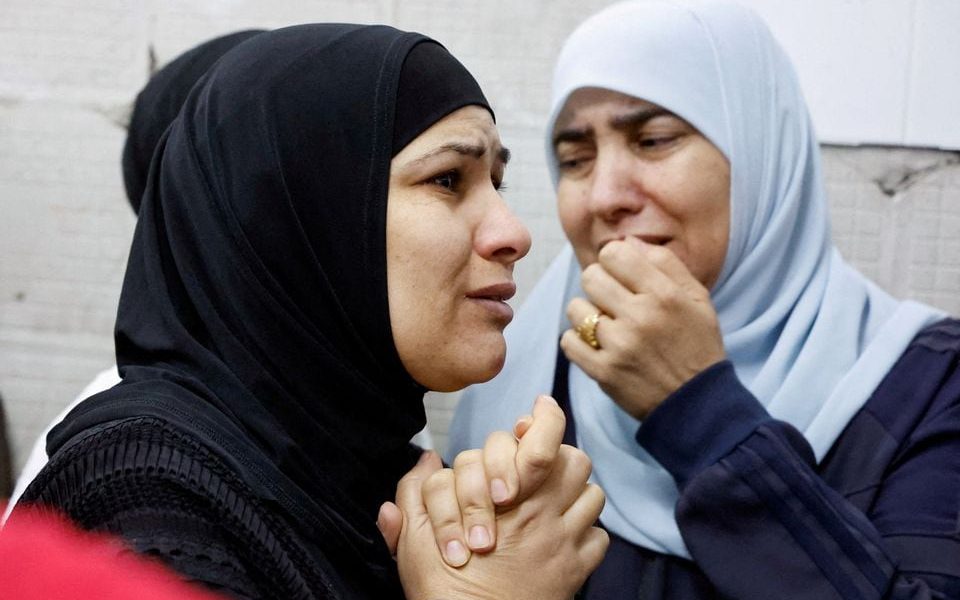 Womean react as they mourn Palestinians who were killed in an Israeli raid, in Tulkarm, in the Israeli-occupied West Bank November 14,2023. REUTERS/Raneen Sawafta Acquire Licensing Rights