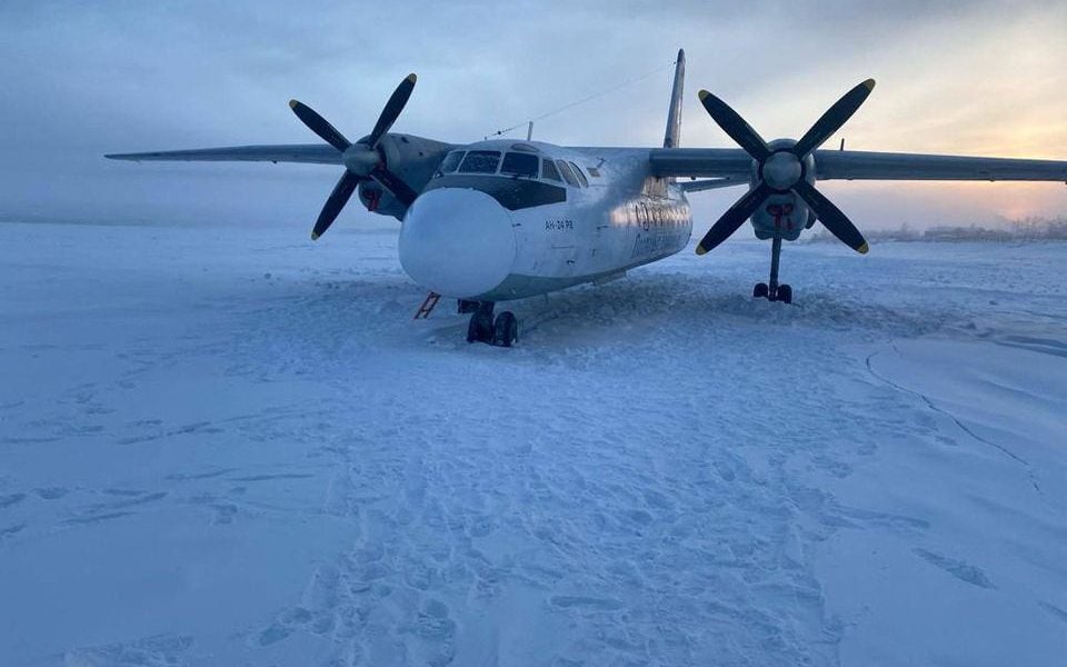A view shows a Polar Airlines' Antonov-24 passenger aircraft following its landing on the Kolyma river near an airport in Zyryanka in the Yakutia region, Russia, December 28, 2023. Russia's Eastern Siberian Transport Prosecutor's Office/Handout via REUTERS