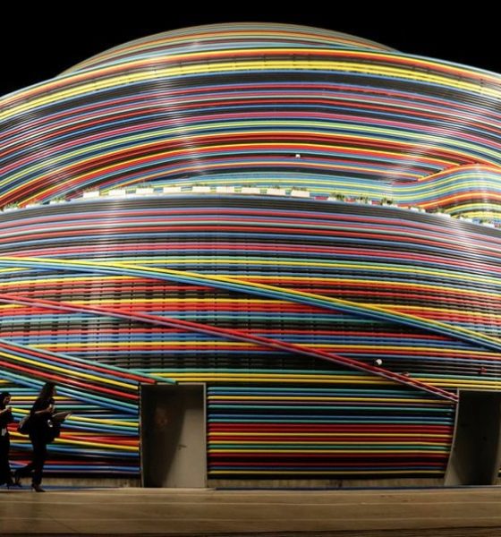 Delegates walk in front of the Russia Pavillion building at Dubai's Expo City during the United Nations Climate Change Conference (COP28) in Dubai, United Arab Emirates, December 6, 2023. REUTERS/Thomas Mukoya