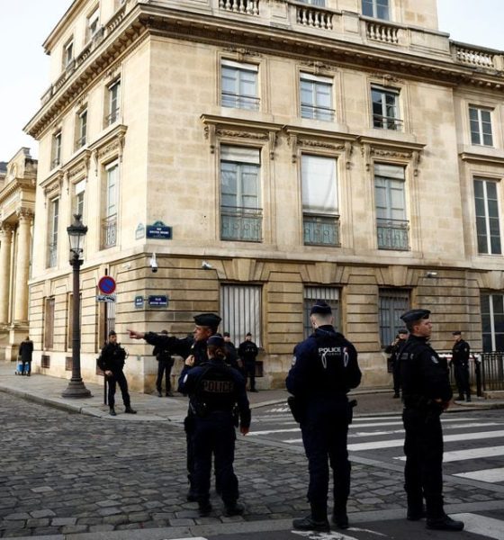 French police stand in position near the National Assembly as protesters gather before the start of a debate on the immigration law in Paris, France, December 11, 2023. REUTERS/Sarah Meyssonnier