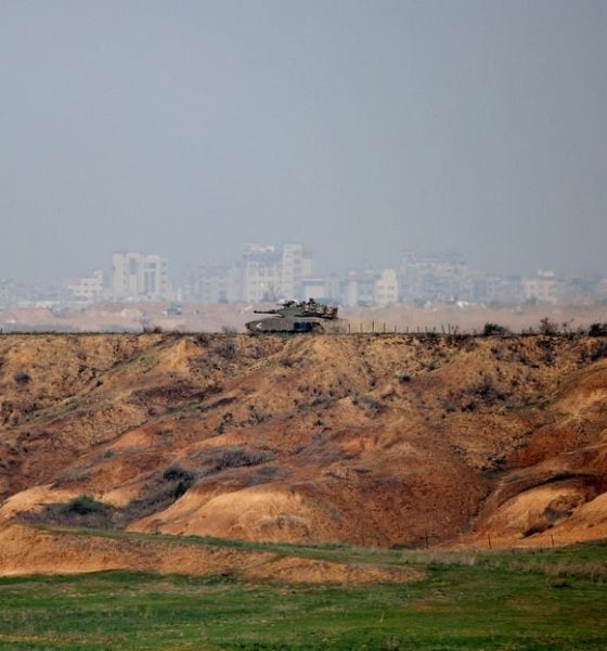 An Israeli tank operates near the Israel-Gaza border, amid the ongoing conflict between Israel and the Palestinian Islamist group Hamas, as seen from southern Israel, December 7, 2023. REUTERS/Athit Perawongmetha