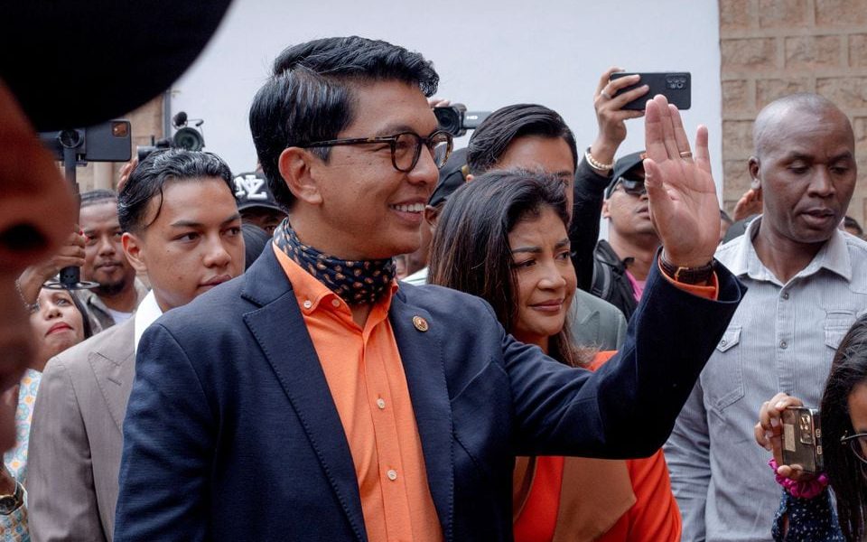 Madagascar's President and a presidential candidate Andry Rajoelina flanked by his wife Mialy Rajoelina as he arrives to cast his ballot at a polling station, during the presidential election in Ambatobe, Antananarivo, Madagascar November 16, 2023. REUTERS/Zo Andrianjafy/ File Photo