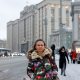 Maria Andreeva, whose husband was mobilised in October 2022 to join the Russian armed forces involved in a military campaign in Ukraine, poses for a picture in front of the headquarters of State Duma, the lower house of parliament, in central Moscow, Russia, November 30, 2023. REUTERS/Yulia Morozova