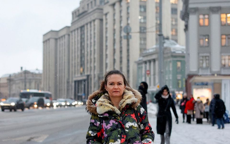 Maria Andreeva, whose husband was mobilised in October 2022 to join the Russian armed forces involved in a military campaign in Ukraine, poses for a picture in front of the headquarters of State Duma, the lower house of parliament, in central Moscow, Russia, November 30, 2023. REUTERS/Yulia Morozova