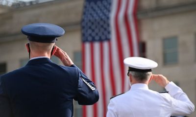 Members of the military salute during the 19th annual September 11 observance ceremony at the Pentagon in Arlington, Virginia, U.S., September 11, 2020. REUTERS/Erin Scott/ File Photo