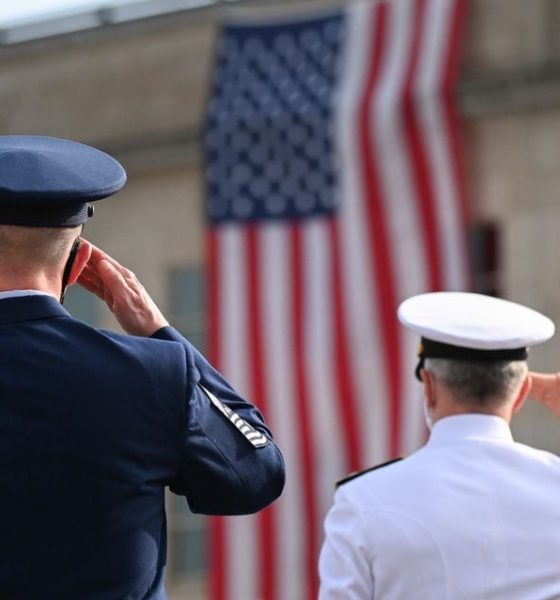Members of the military salute during the 19th annual September 11 observance ceremony at the Pentagon in Arlington, Virginia, U.S., September 11, 2020. REUTERS/Erin Scott/ File Photo