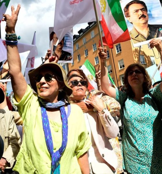 People react to the verdict of the trial of Hamid Noury, a former Iranian prosecution official accused of crimes against international law and murder in Iran in 1988, outside the Stockholm District Court in Stockholm, Sweden July 14, 2022. Noury was sentenced to a lifetime in prison. Chris Anderson/TT News Agency/via REUTERS/File Photo