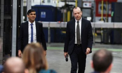 Prime Minister Rishi Sunak (left) and Northern Ireland Secretary Chris Heaton-Harris hold a Q&A session with local business leaders during a visit to Coca-Cola HBC in Lisburn, Co Antrim in Northern Ireland. February 28, 2023. Liam McBurney/Pool via REUTERS/File Photo