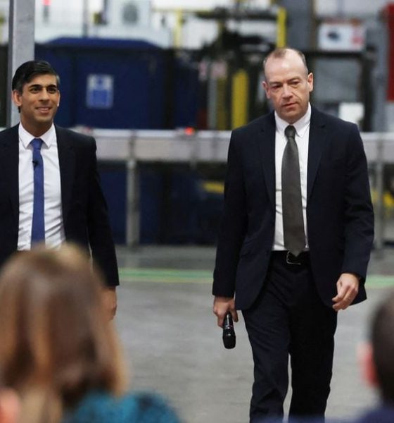 Prime Minister Rishi Sunak (left) and Northern Ireland Secretary Chris Heaton-Harris hold a Q&A session with local business leaders during a visit to Coca-Cola HBC in Lisburn, Co Antrim in Northern Ireland. February 28, 2023. Liam McBurney/Pool via REUTERS/File Photo