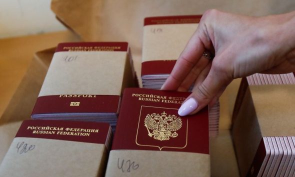 Russian passports are pictured at Goznak printing factory in Moscow, Russia July 11, 2019. REUTERS/Maxim Shemetov/File Photo