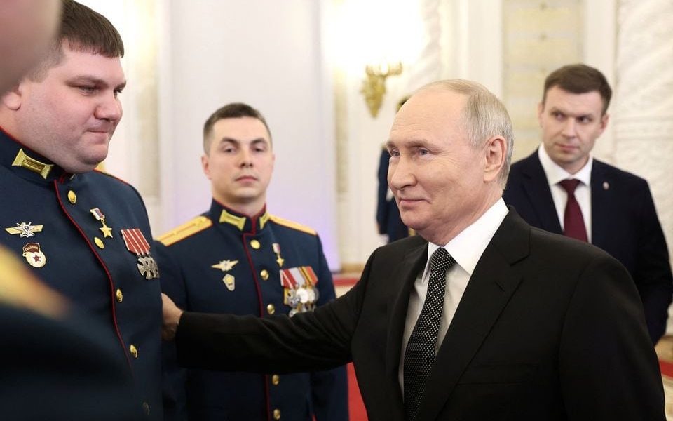 Russia's President Vladimir Putin attends a ceremony to present Gold Star medals to service members, bearing the title of Hero of Russia and involved in the country's military campaign in Ukraine, on the eve of Heroes of the Fatherland Day at the St. George Hall of the Grand Kremlin Palace in Moscow, Russia, December 8, 2023. Sputnik/Valeriy Sharifulin/Pool via REUTERS
