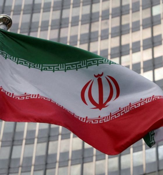 The Iranian flag flutters in front of the International Atomic Energy Agency (IAEA) organisation's headquarters in Vienna, Austria, June 5, 2023. REUTERS/Leonhard Foeger/File Photo