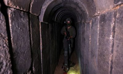 An Israeli soldier walks through a tunnel underneath Al Shifa Hospital in Gaza City, amid the ongoing ground operation of the Israeli army against Palestinian Islamist group Hamas, in the northern Gaza Strip, November 22, 2023. REUTERS/Ronen Zvulun/File Photo