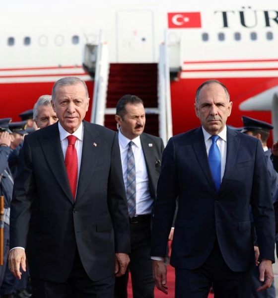 Turkish President Tayyip Erdogan is welcomed by Greek Foreign Minister George Gerapetritis upon his arrival at the Eleftherios Venizelos International Airport in Athens, Greece December 7, 2023. Turkish Presidential Press Office/Handout via REUTERS