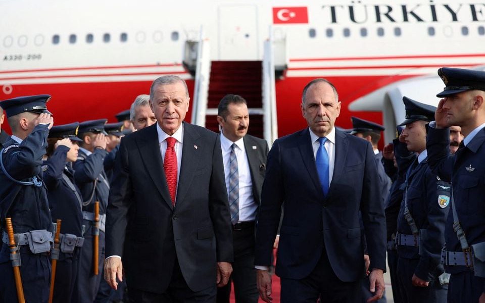 Turkish President Tayyip Erdogan is welcomed by Greek Foreign Minister George Gerapetritis upon his arrival at the Eleftherios Venizelos International Airport in Athens, Greece December 7, 2023. Turkish Presidential Press Office/Handout via REUTERS