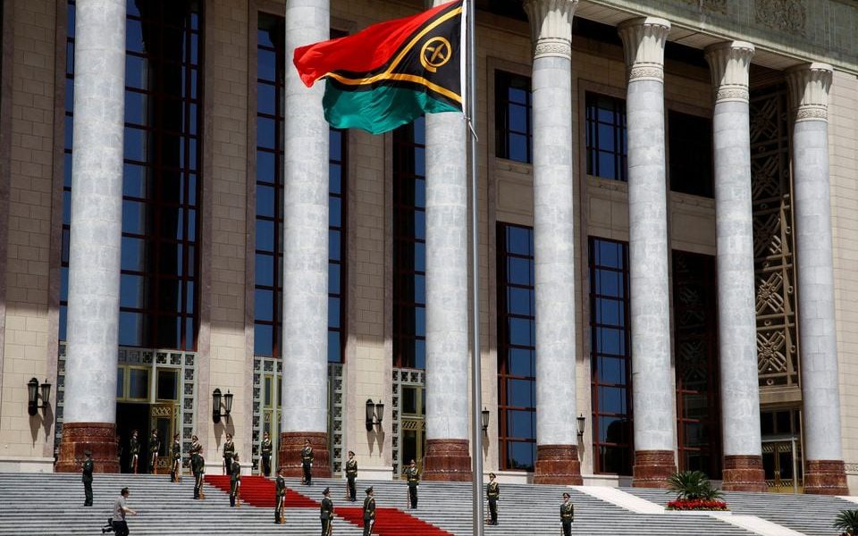 A Vanuatu flag flutters outside the Great Hall of the People before a welcome ceremony for Vanuatu Prime Minister Charlot Salwai in Beijing, China May 27, 2019. REUTERS/Florence Lo/File Photo A Vanuatu flag flutters outside the Great Hall of the People before a welcome ceremony for Vanuatu Prime Minister Charlot Salwai in Beijing, China May 27, 2019. REUTERS/Florence Lo/File Photo
