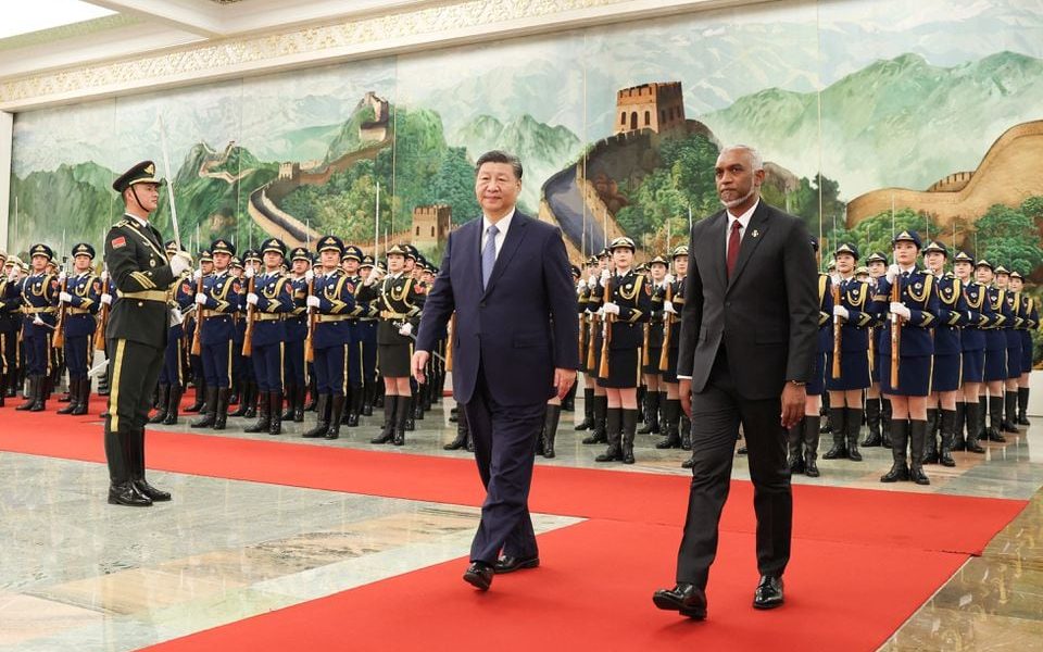Chinese President Xi Jinping and Maldivian President Mohamed Muizzu attend a welcome ceremony at the Great Hall of the People in Beijing, China January 10, 2024. cnsphoto via REUTERS