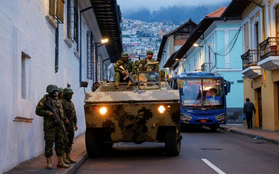 Soldiers in an armoured vehicle patrol the city's historic centre following an outbreak of violence a day after Ecuador's President Daniel Noboa declared a 60-day state of emergency following the disappearance of Adolfo Macias, leader of the Los Choneros criminal gang from the prison where he was serving a 34-year sentence, in Quito, Ecuador, January 9, 2024. REUTERS/Karen Toro