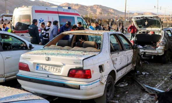 People gather at the scene of explosions during a ceremony held to mark the death of late Iranian General Qassem Soleimani, in Kerman, Iran, January 3, 2024. WANA (West Asia News Agency) via REUTERS